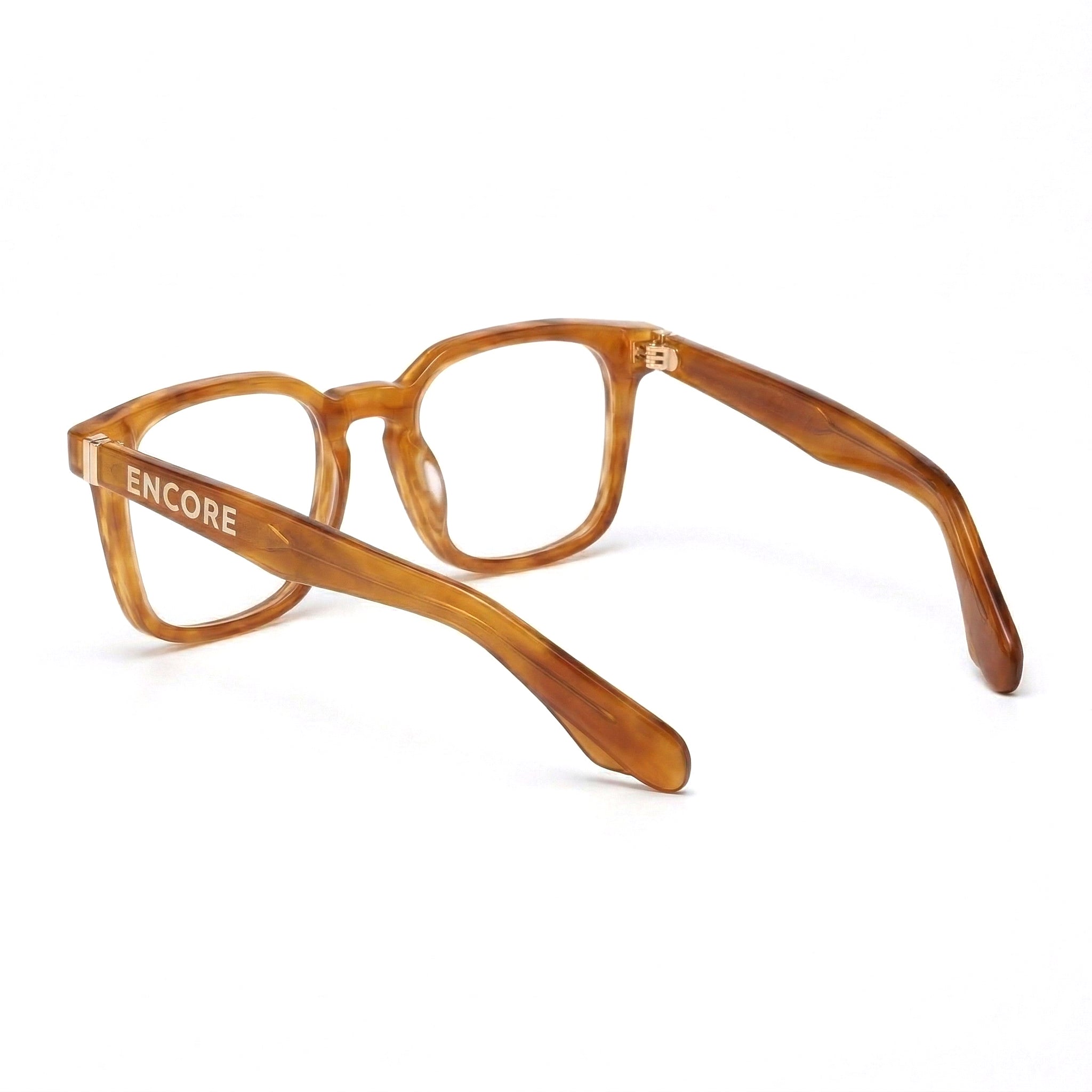 Encore Prestige glasses closeup side view in light brown gold frames