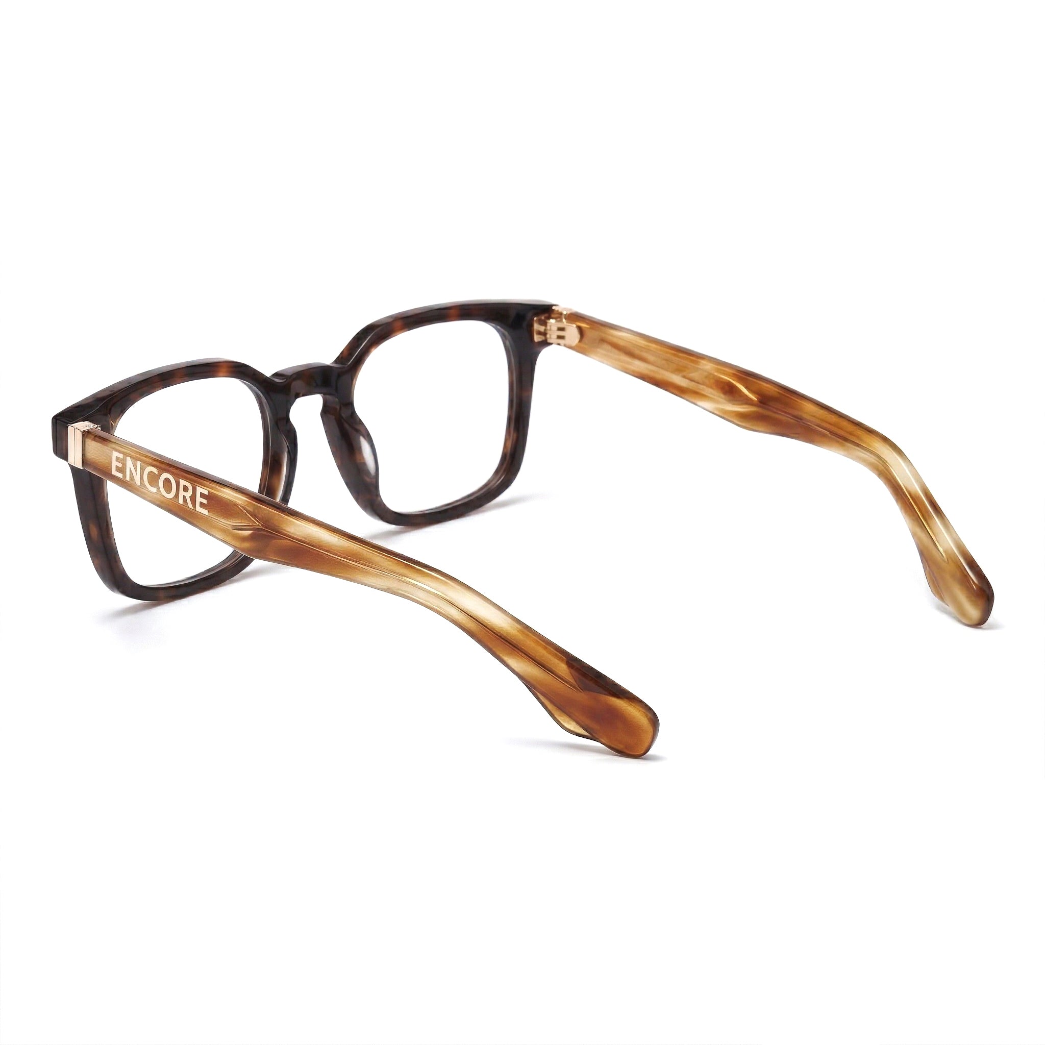 Encore Prestige glasses closeup side view in hawksbill gold frames